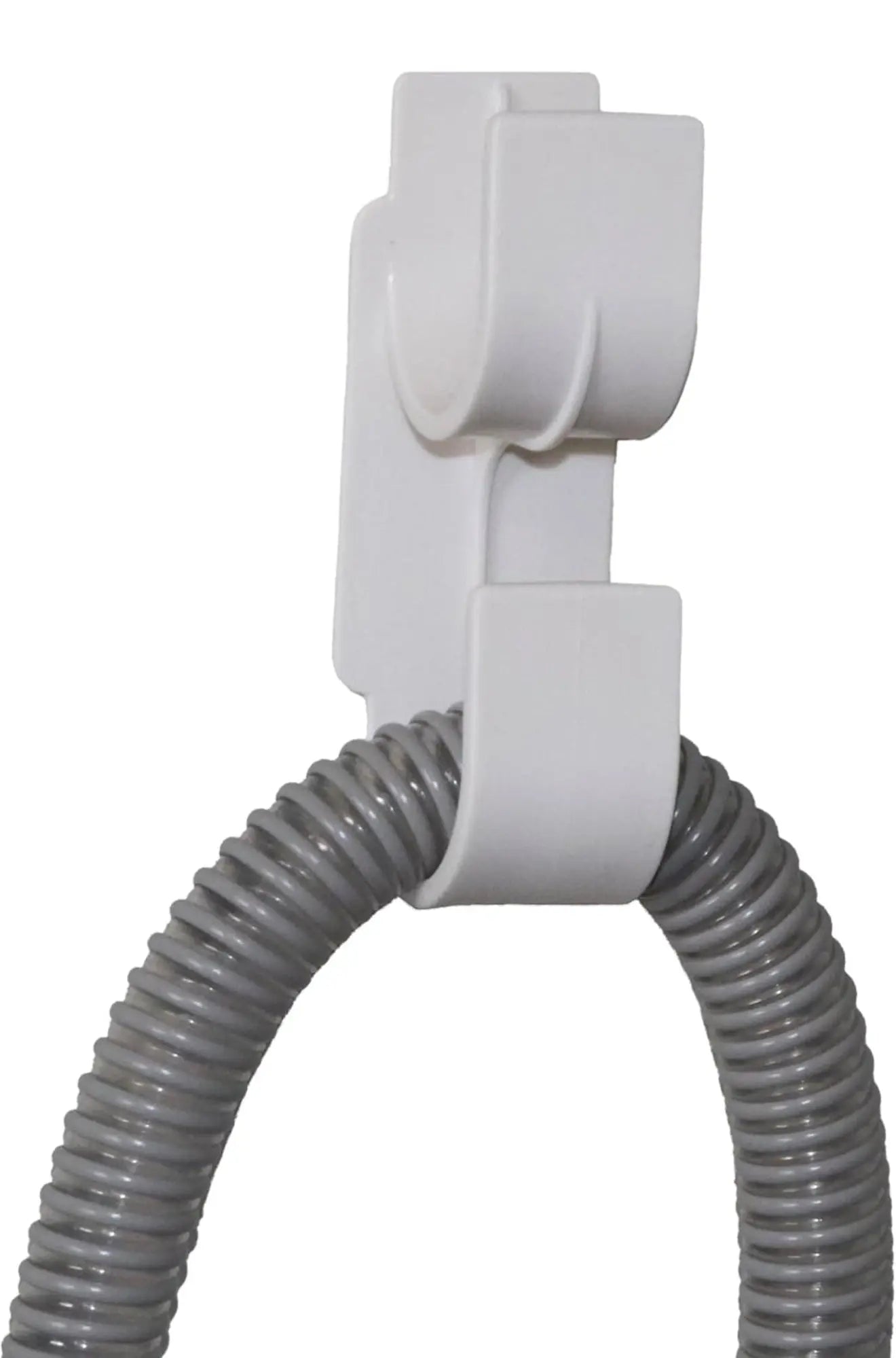 White hose holder with a coiled gray hose on a white background