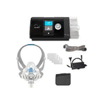 ResMed CPAP machine with accessories on a white background