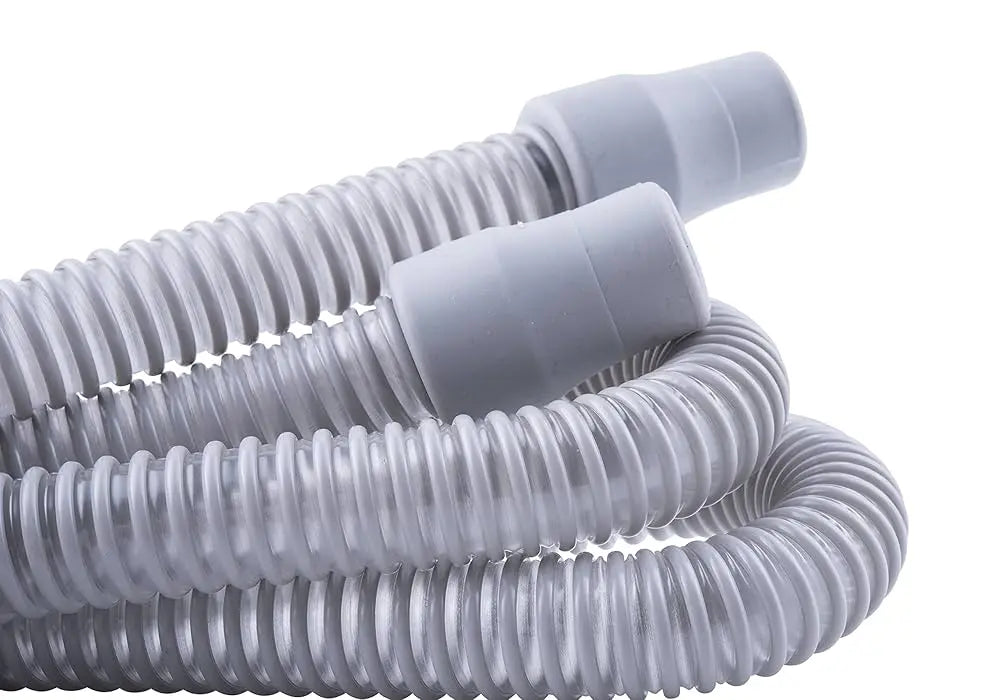 Coiled gray hose on a white background