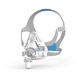 Resmed CPAP mask with clear facepiece and gray headgear on a white background