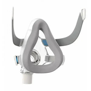 Gray and white CPAP mask on a white background