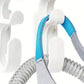 CPAP mask hanger with hose holder for convenient storage