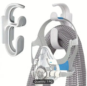 CPAP mask with hose on a white background