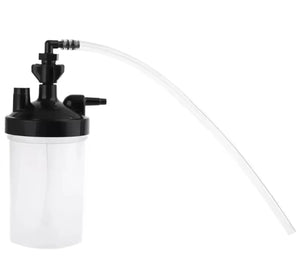 Clear container with black top and hose on a white background
