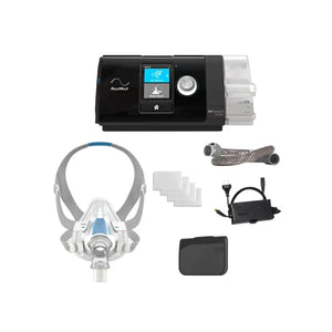 ResMed CPAP machine with accessories on a white background