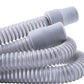 Coiled gray hose on a white background